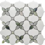 White marble and gray mosaic tile with a floral pattern, featuring smooth, polished surfaces and intricate design details.