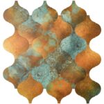 Rustic peel and stick tile wall backsplash with a weathered, textured finish in shades of blue, orange, and brown for easy ho.