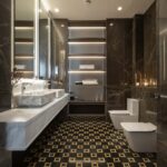 Elegant black and gold patterned ceramic tiles in a modern bathroom setting.