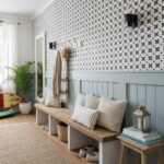 Blue and white geometric patterned tile wall with textured surface in a modern home interior.
