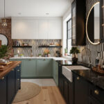 A modern kitchen featuring a black and white geometric patterned tile backsplash, complemented by light green and dark navy c.