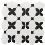 Black and white mosaic tile with a floral-inspired pattern, smooth texture, and glossy finish.