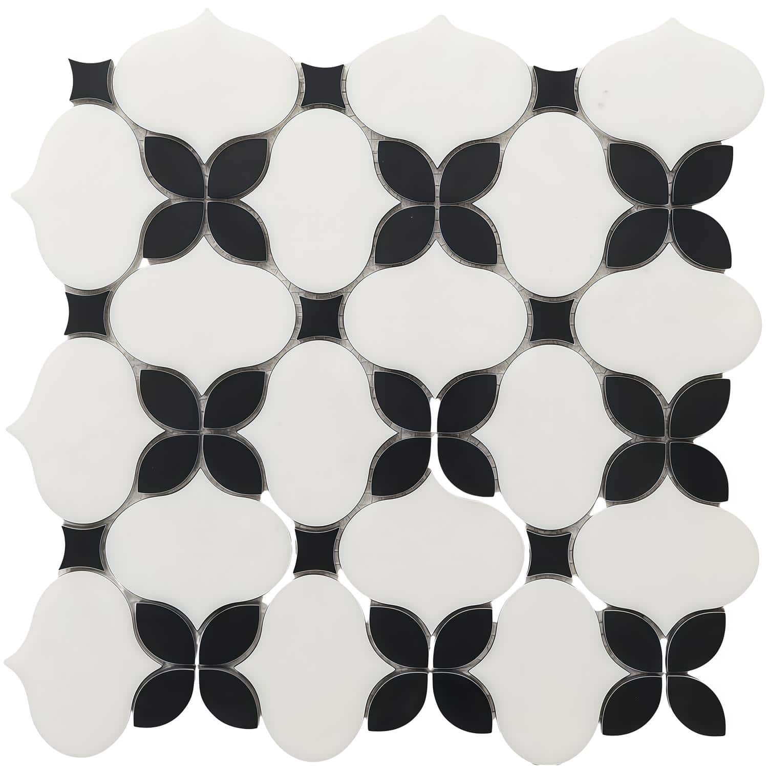 Black and white mosaic tile with a floral-inspired pattern, smooth texture, and glossy finish.
