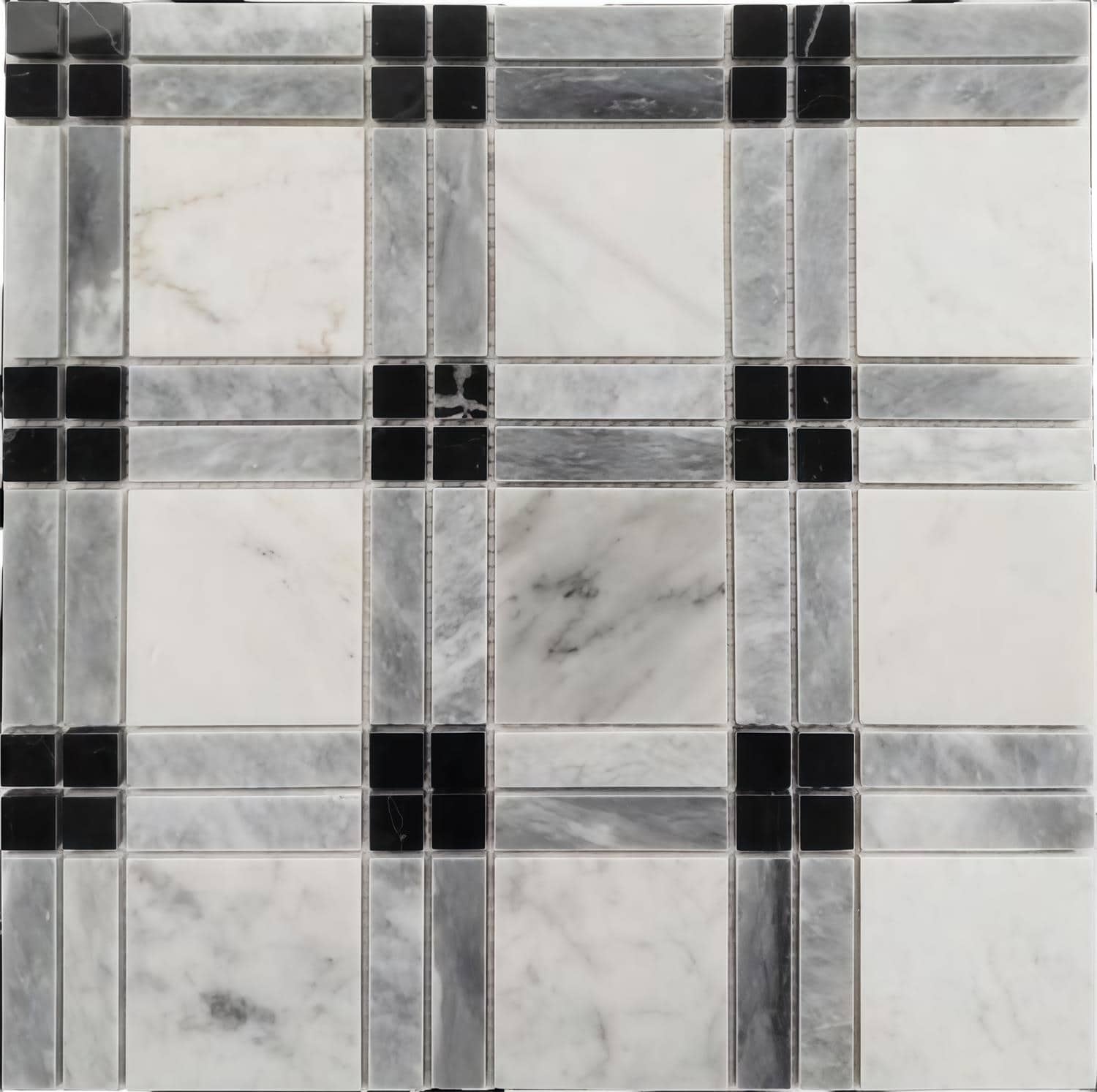 White marble tiles with gray veining and black accent tiles.