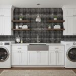 Black glass mosaic tile backsplash behind sink with open wooden shelves and potted plants.