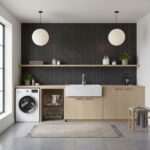 Bright laundry room with black textured tiles, white farmhouse sink, and light wood cabinetry.