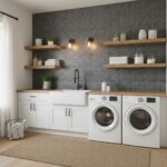 Dark gray textured tile wall in laundry room with wooden shelves and white cabinetry.