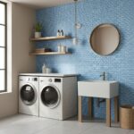 Blue glass mosaic tile backsplash in laundry room with washer, sink, and wooden shelves.