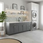 Image of a modern laundry room with peel and stick tile backsplash behind the sink. Includes stacked washer and dryer, white.
