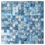Close-up of a blue mother of pearl shell tile mosaic, showcasing iridescent seashell pieces arranged in a grid pattern.