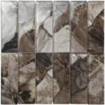 Up of marble glass mosaic tiles with natural veining and glossy finish.