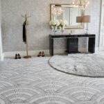 Black marble tile with smooth, polished texture and subtle veining.