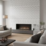 Light gray textured wall tile with a herringbone pattern, smooth finish, and subtle sheen, installed above a contemporary fir.