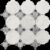 White marble tile with gray accents, geometric design, polished texture.
