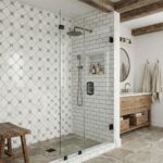 Geometric patterned white and beige tiles for shower wall, textured surface, modern style.