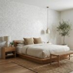 White textured ceramic tile wall, smooth surface with subtle pattern.