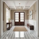 Bright entryway featuring patterned ceramic tiles, neutral wall colors, and classic decor accents.