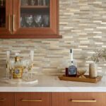 Modern kitchen backsplash with peel and stick tiles in neutral tones, perfect for easy DIY updates.