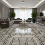 Modern living room with gray marble tiles featuring black geometric accents, complemented by contemporary furniture and lush.
