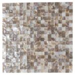 Close-up of mother of pearl shell tile with iridescent, shimmering surface in a mosaic pattern.