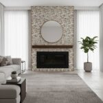 Mother of pearl shell tile accent wall around fireplace with a round mirror, modern living room interior design.