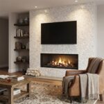 Seashell tile wall behind fireplace with a mounted TV in a modern living room setting.