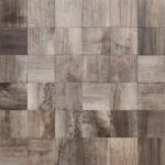 Close-up of peel and stick wood tile with natural grain and color variations for wall or backsplash decor.