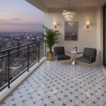 Balcony with patterned tile flooring, city skyline view, modern furniture, and stylish lighting.