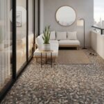 Bright, textured pebble-pattern tile with earthy tones on balcony floor.