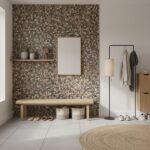Earth-toned mosaic tile with textured surface and natural stone appearance.
