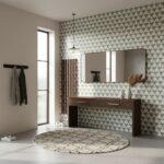 Geometric patterned tile wall with neutral tones.