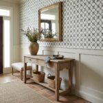 Decorative blue and white patterned ceramic tiles in a hallway.