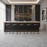 Modern black and gold textured tile in a sleek bar area with minimalist decor.