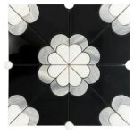 Black and white ceramic tile with floral geometric pattern, glossy finish, and intricate design.