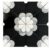 Black and white ceramic tile with floral geometric pattern, glossy finish, and intricate design.