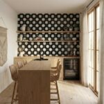 Black and white floral patterned ceramic tile wall.