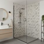 Gray floral patterned tile with textured surface in the shower area.