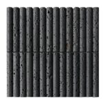 Dark gray textured volcanic stone tiles with porous surface, ideal for contemporary home decor.