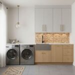 Laundry room with peel and stick tile backsplash behind the sink and countertop.