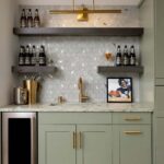 Modern kitchen with peel and stick wall tiles and floating shelves.