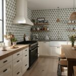 Bright white and gray geometric patterned tiles with a matte finish, used as a backsplash in a modern kitchen.