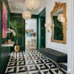 Describe tile color, texture, and design: Black and white geometric patterned tiles with a smooth finish, creating a modern a.