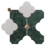 Green marble tiles with white clover-shaped accents and brass details. Elegant, natural stone design for sophisticated interi.
