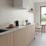 Seashell tile backsplash in a modern kitchen with natural light, wooden accents, and minimal decor, creating a fresh and eleg.