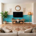 Mother of pearl shell tile accent wall in living room with boho decor and natural elements.
