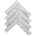 White marble herringbone tile with subtle gray veining, smooth texture, and polished finish. Perfect for sophisticated floori.