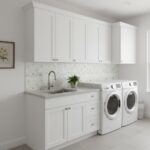 Bright laundry room with elegant mother of pearl shell tile backsplash. Durable pearl and seashell tile accents complement wh.