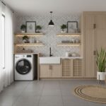 Modern laundry room with peel and stick wall tile, cabinetry, and decor accents.