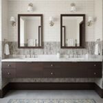 Bright white subway tiles with a smooth texture and glossy finish, paired with dark wood vanity for a modern look.