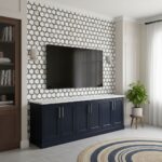 Peel and stick tile backsplash on the wall behind the TV, featuring a geometric honeycomb pattern in a contemporary living ro.